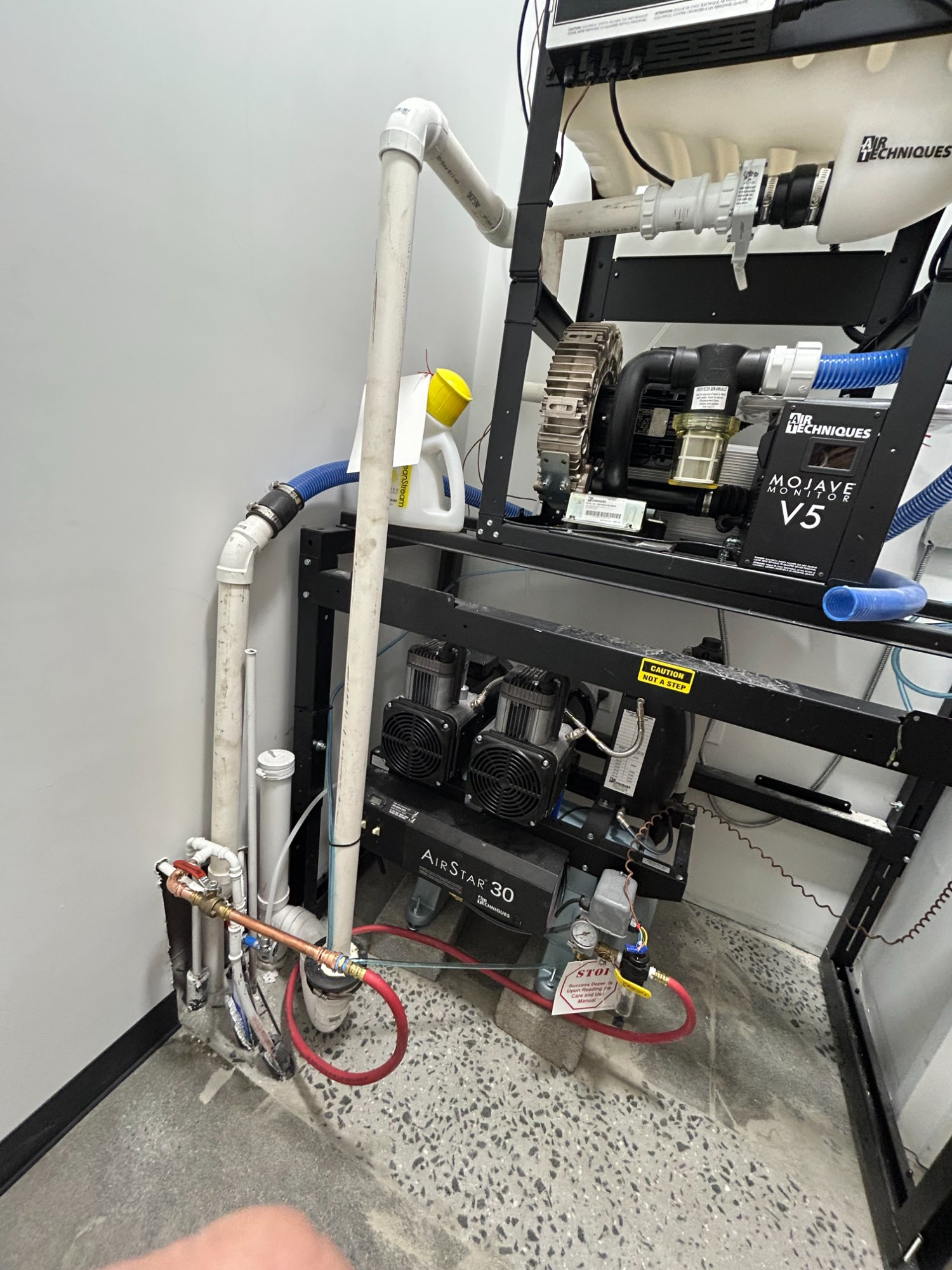 Air Techniques AirStar 30 compressor and Mojave V5 vacuum with copper and PVC plumbing connections