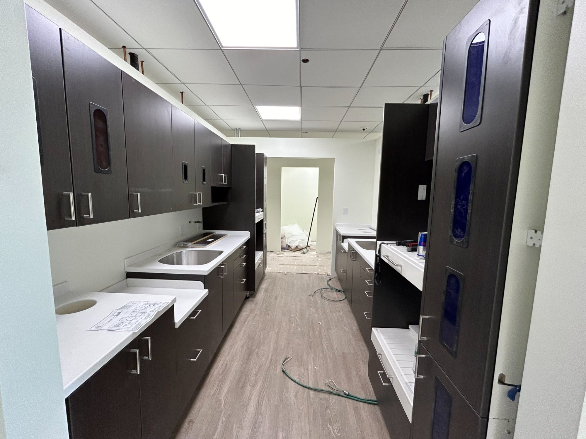 Sterilization room with floor-to-ceiling dental cabinetry and instrument storage