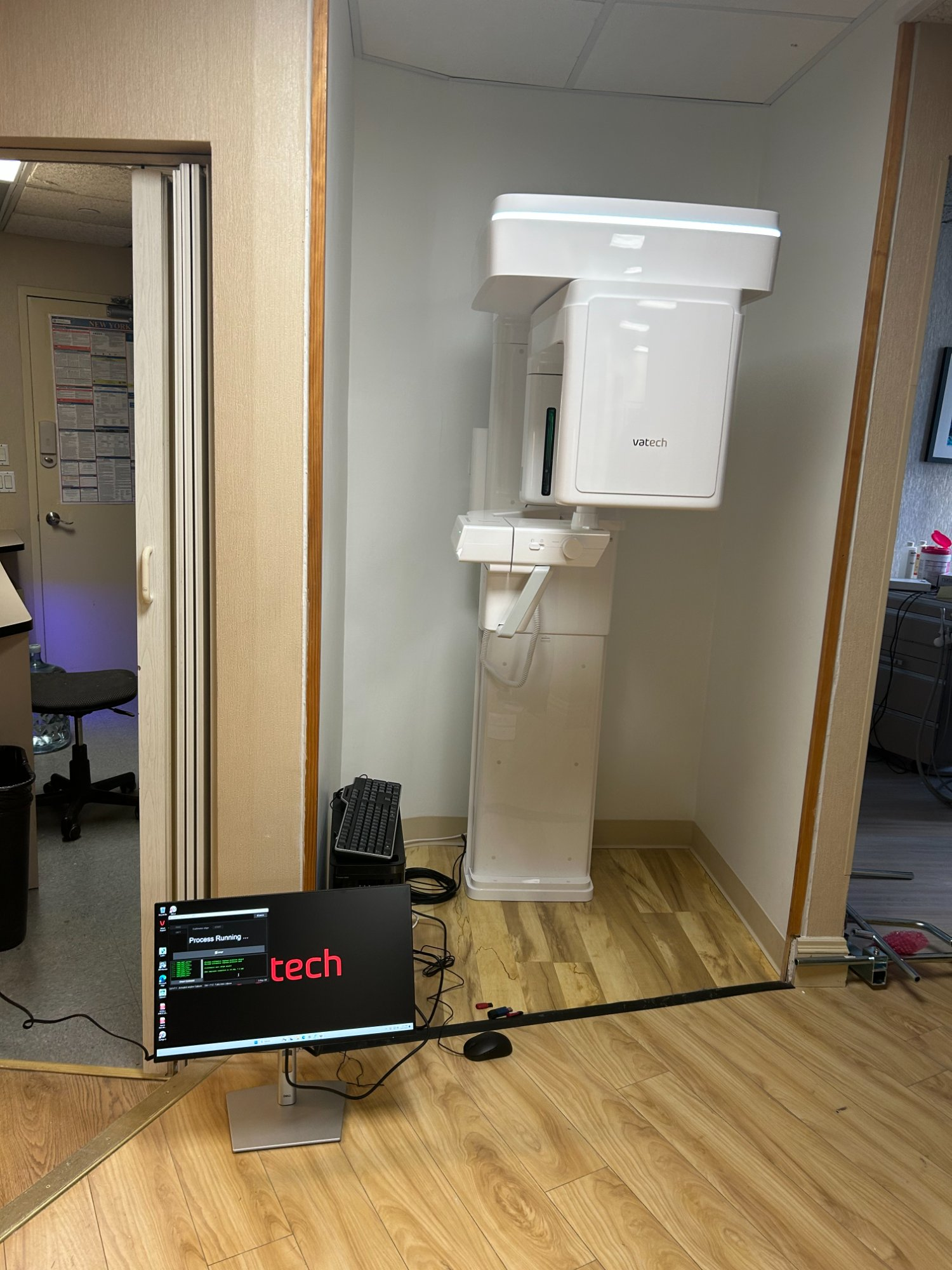 Vatech CBCT 3D imaging unit installed in dedicated imaging room with workstation and monitor