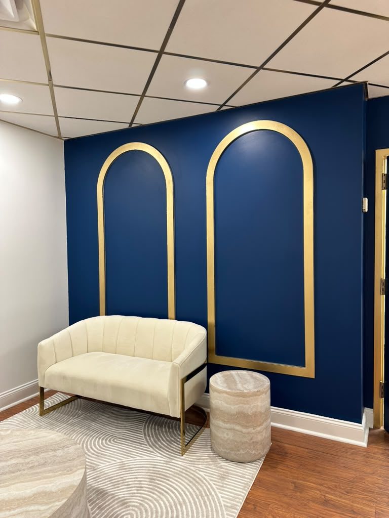 Navy accent wall and new trim in a renovated Scarsdale NY dental office